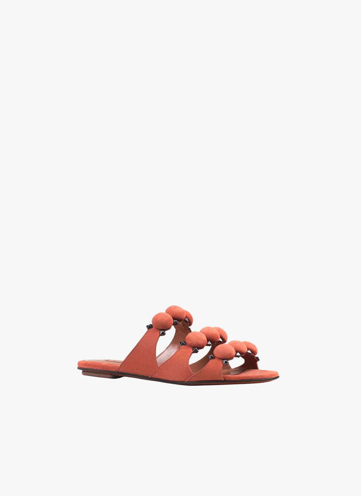 Bombe suede flat mules ALAÏA CARAMEL BOMBE SUEDE FLAT MULES